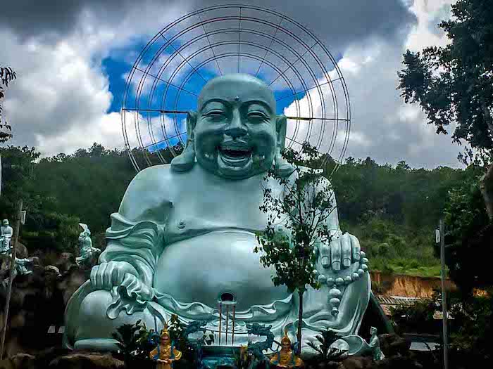 a laughing buddha in vietnam