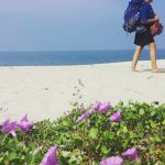 author priyanka gupta an itinerant writer travel blogger digital nomad on a beach