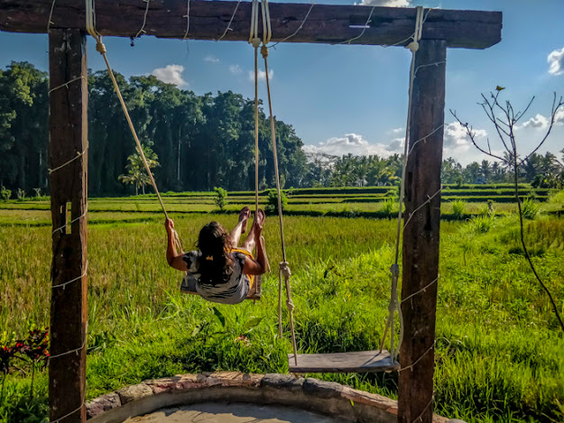 on a swing in bali
