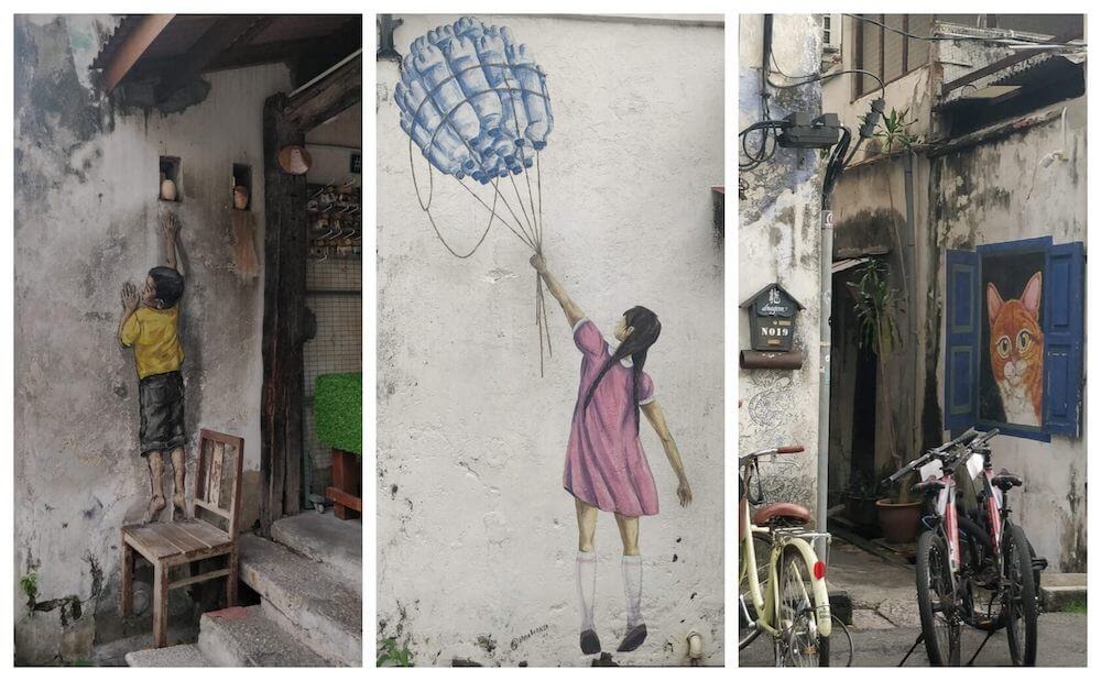 boy+and+girl+reaching+up+cat+looking+street+art+penang+malaysia