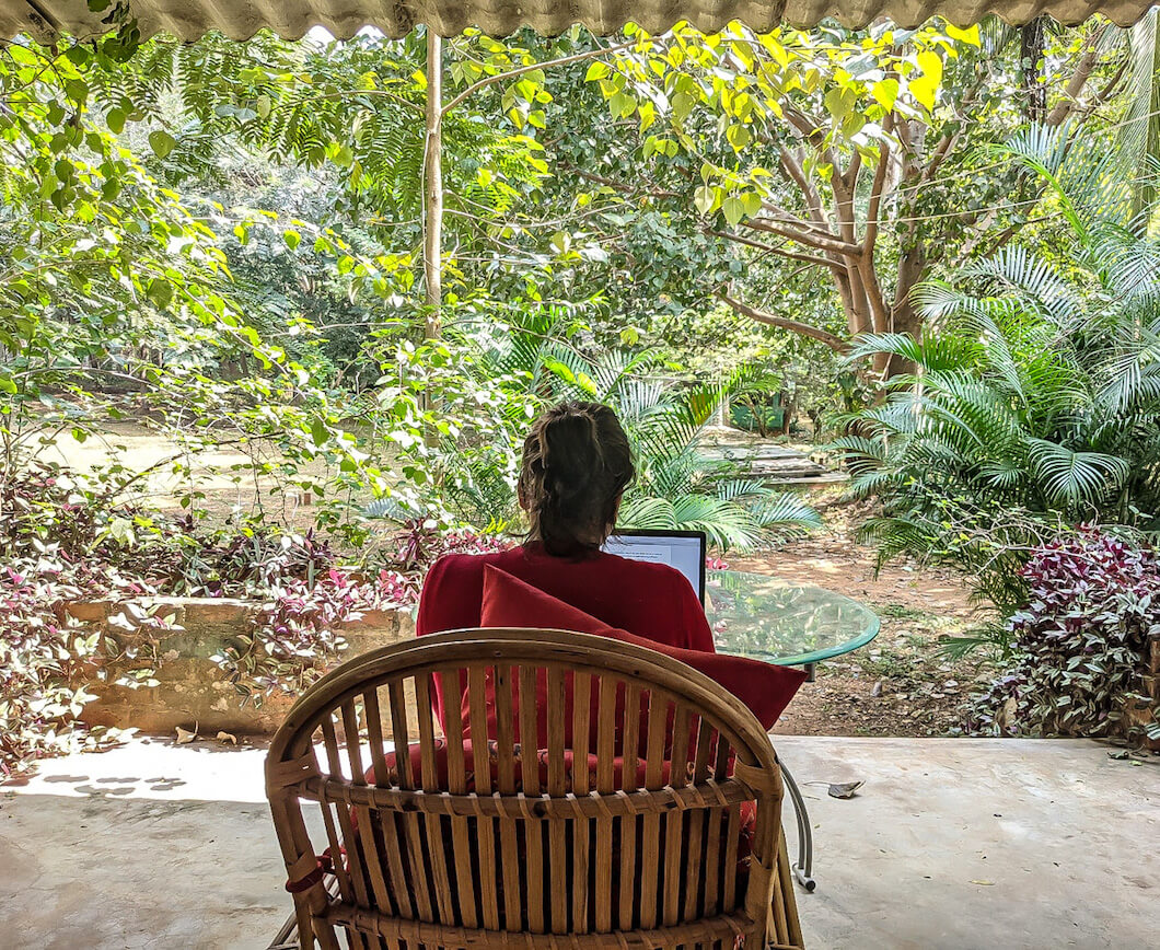 sitting and working in a homestay in india in karnataka bangalore